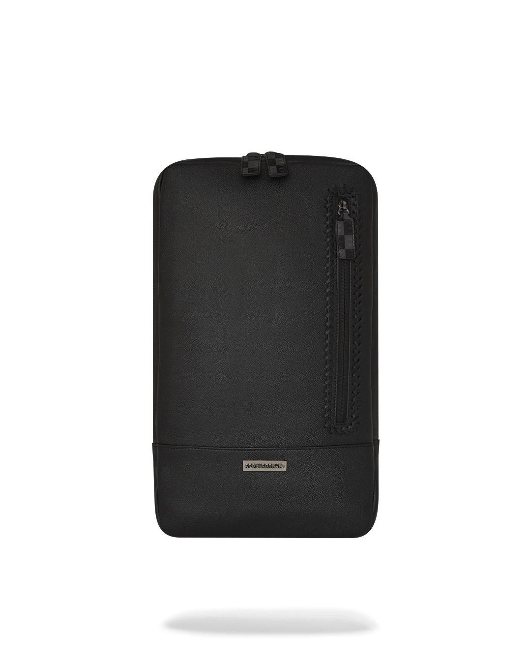 Faux leather smart backpack worn over a shoulder in an urban setting