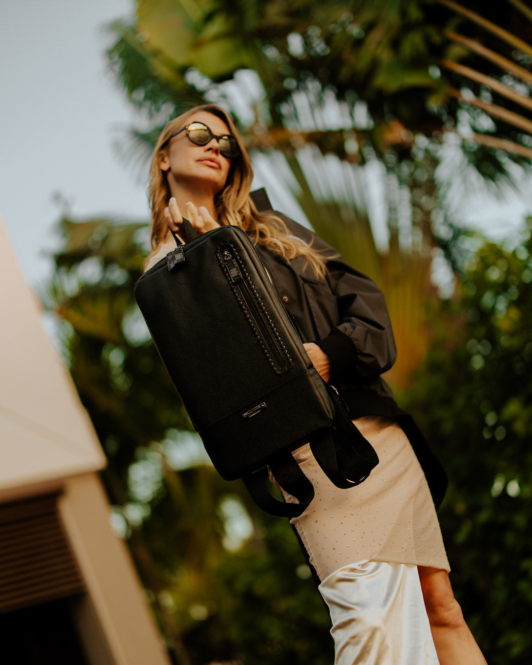 Close-up of the backpacks ergonomic padding and whip-stitch detailing