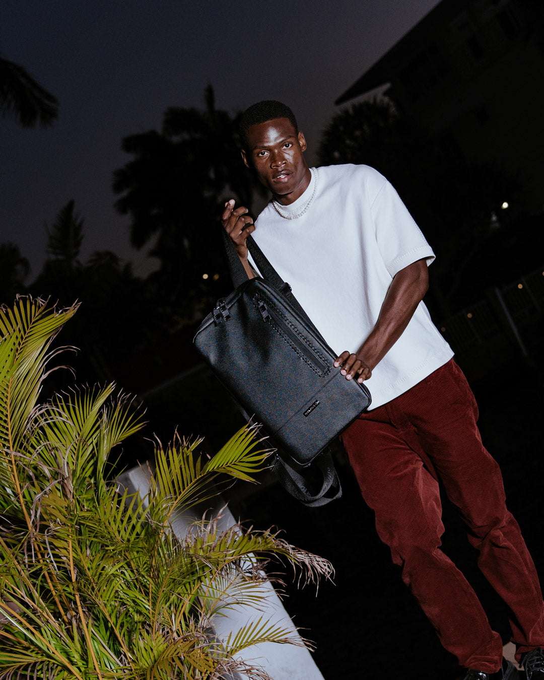 Close-up of the backpacks ergonomic padding and whip-stitch detailing