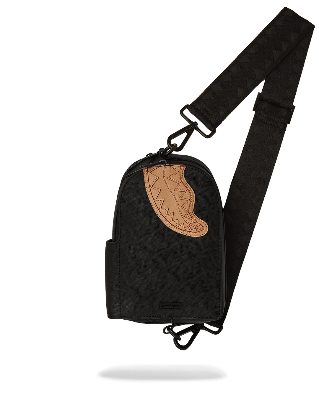 Black tactical sling backpack worn crossbody in urban setting