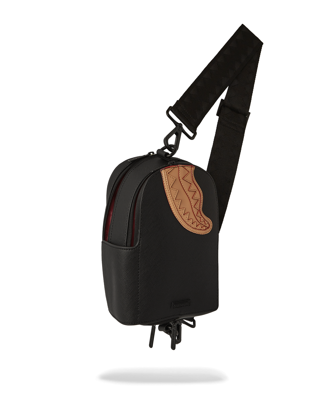 Close-up of zippered compartments and adjustable strap