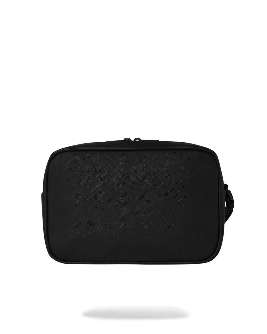 Man holding the toiletry bag while packing a suitcase for travel.