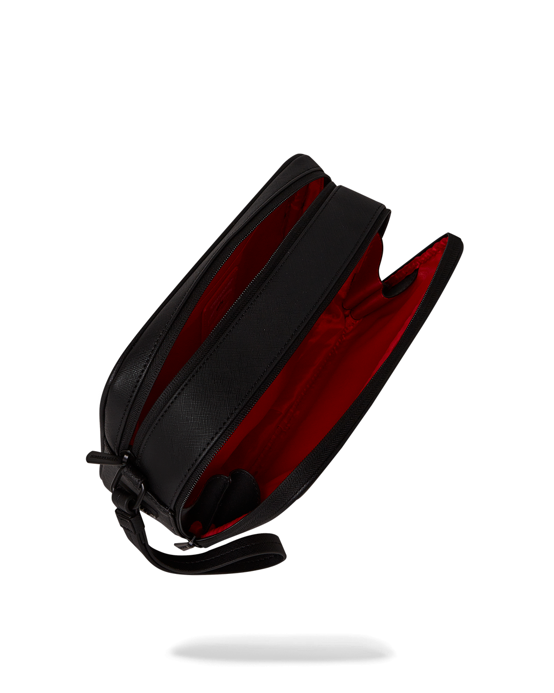Close-up of the Grand Tourer toiletry bags interior pockets and zipper.