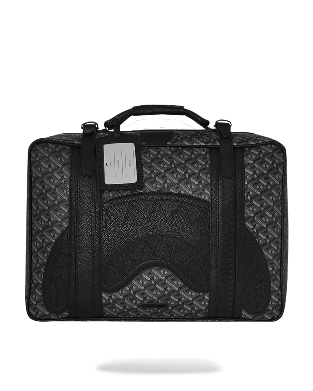 Thunderclap Convertible Faux Leather Backpack being carried as a handheld briefcase