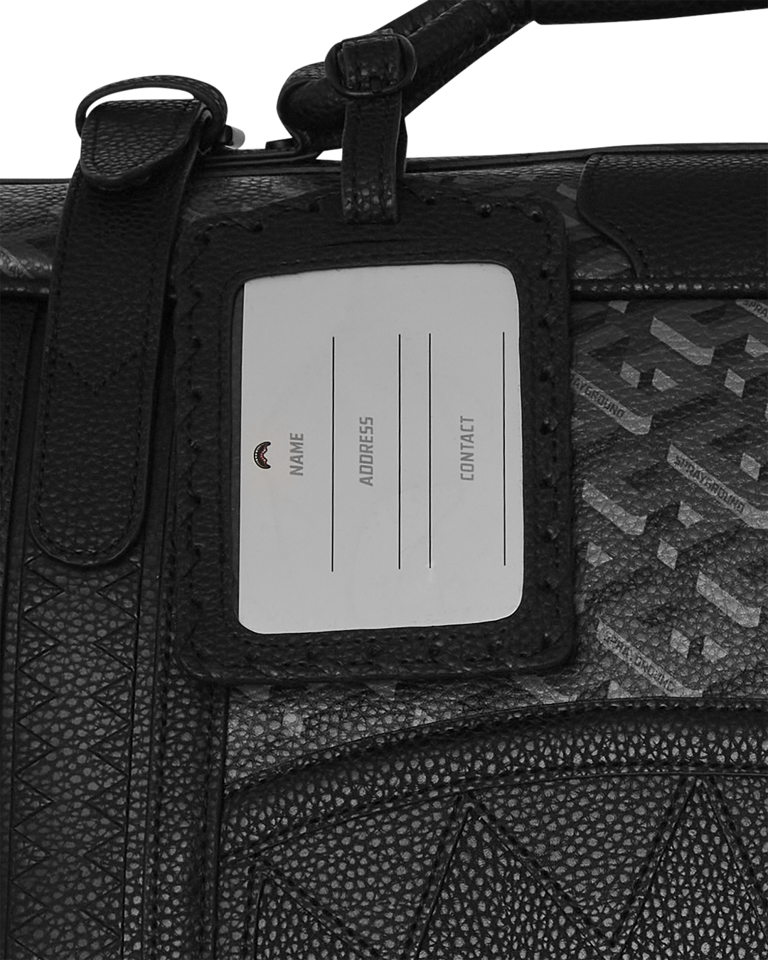 Close-up of the backpacks embossed sharkmouth details and whip stitching