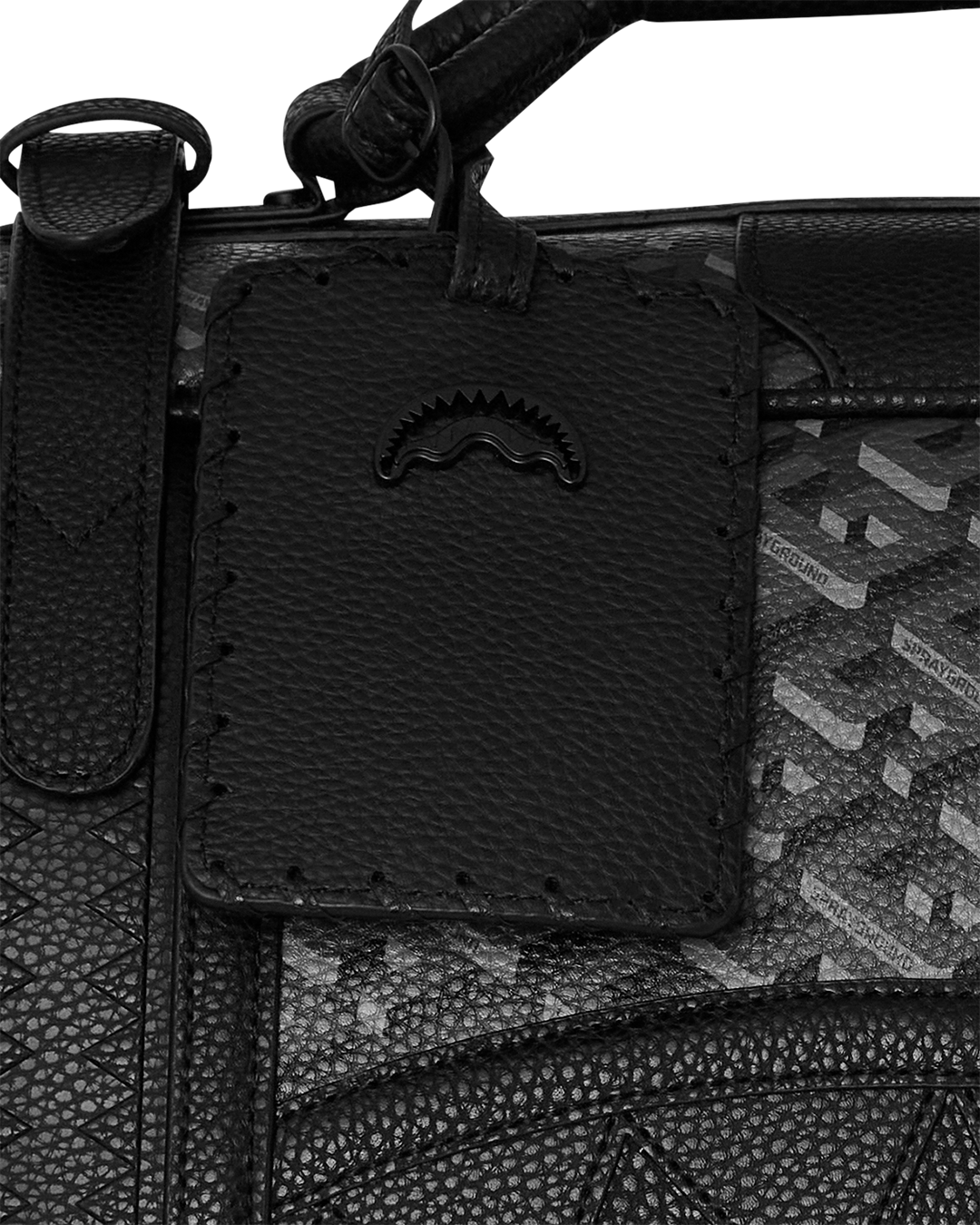 Thunderclap Convertible Faux Leather Backpack being carried as a handheld briefcase