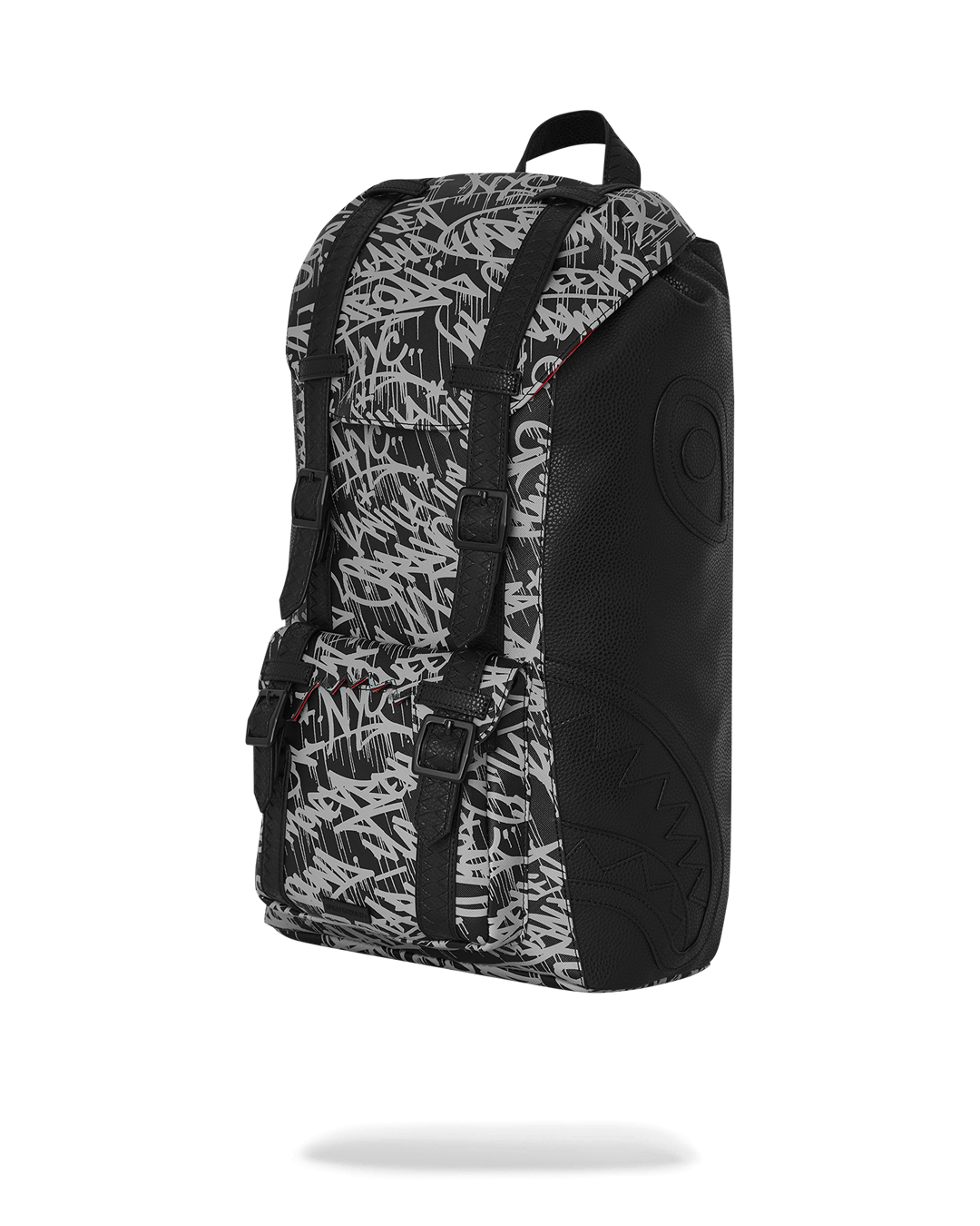 Vegan leather laptop backpack worn by a woman in an urban setting