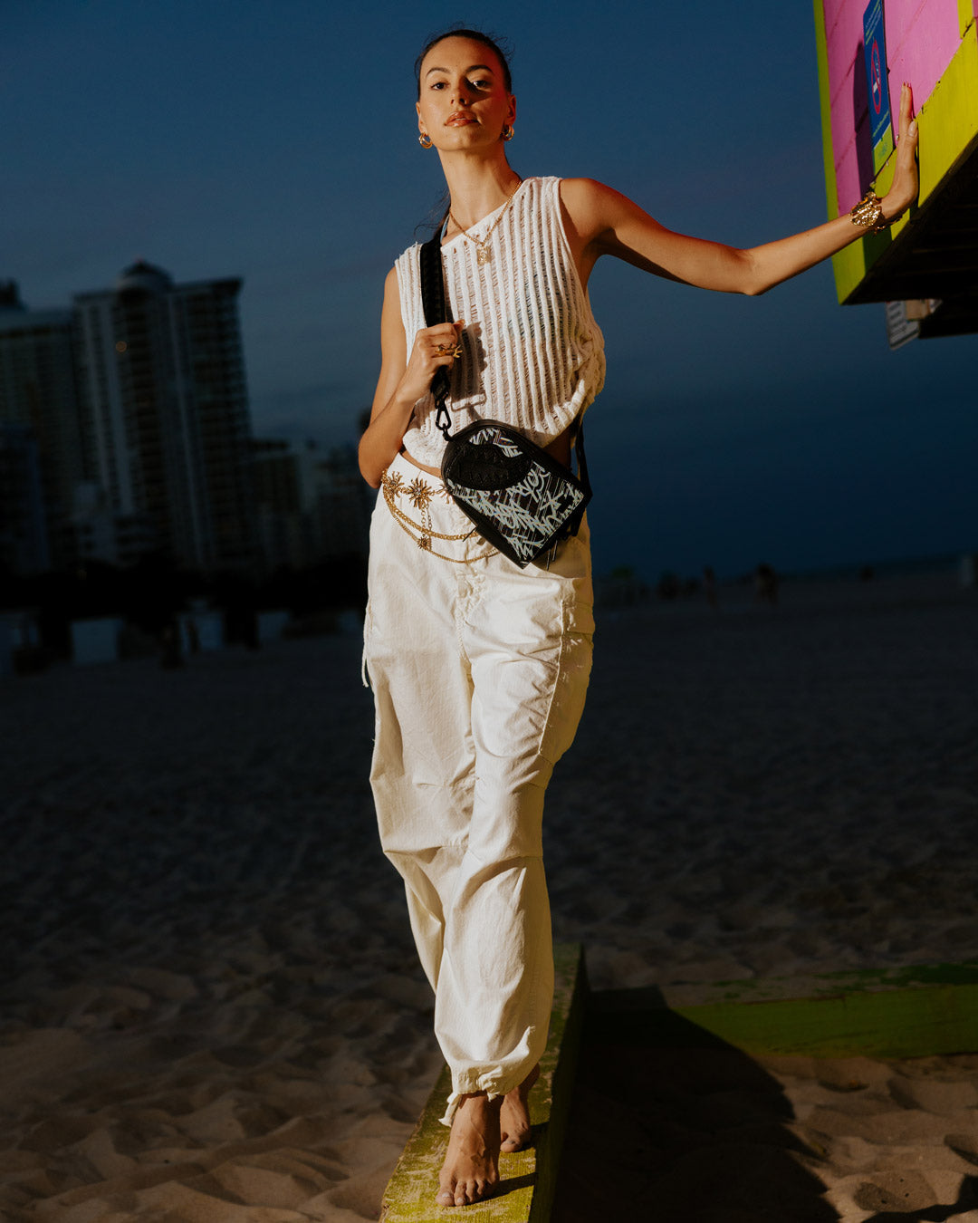 Front view of the A.M.P.M Crossbody Sling Bag showcasing its compartments