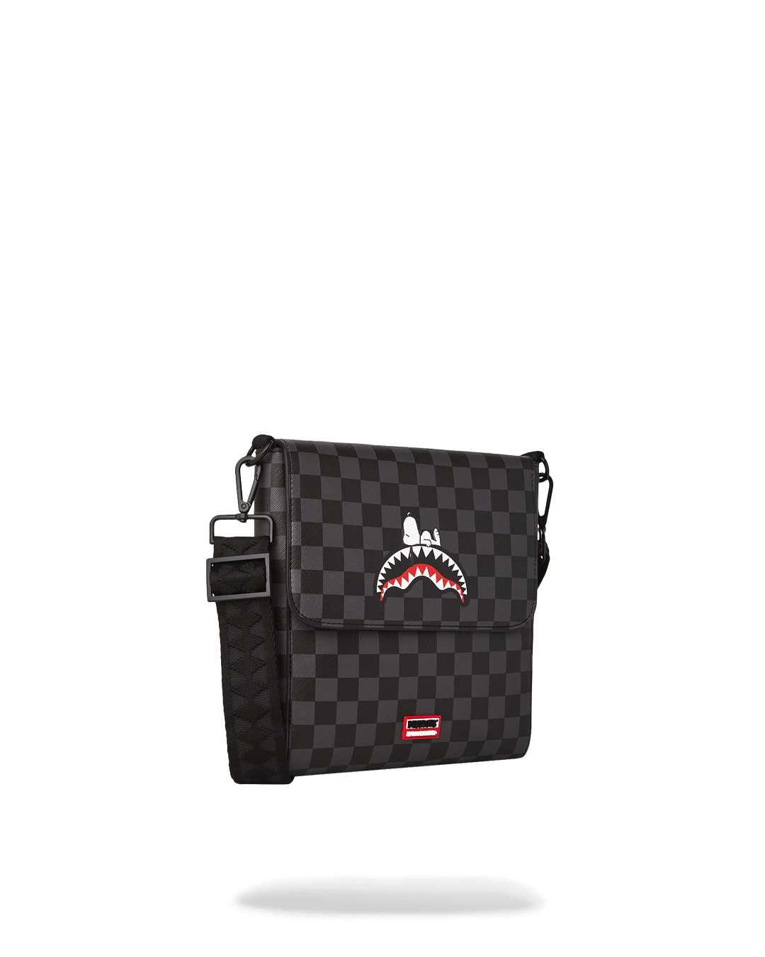 Interior of the sling bag showing zipped pocket and spacious compartment