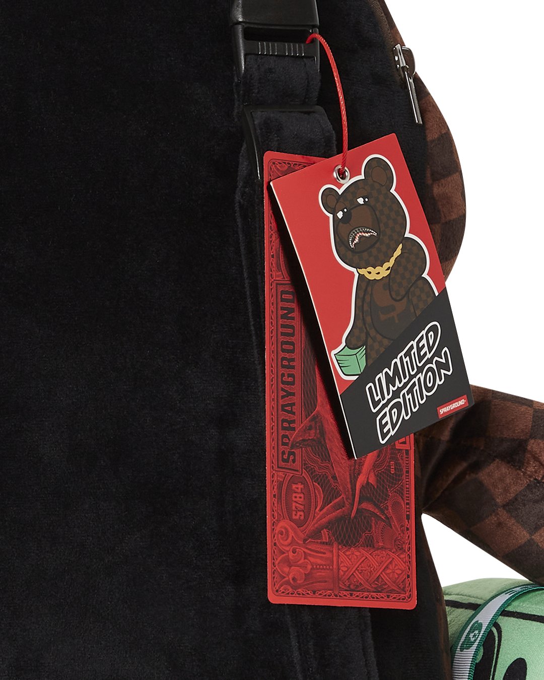 Front view of teddy bear backpack showing lenticular face design and belly pocket