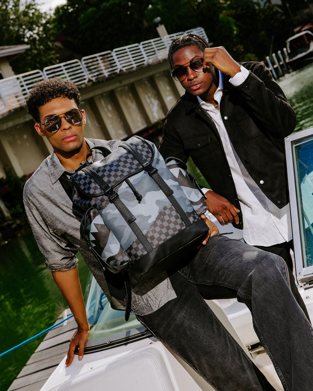 Close-up of the sleek exterior with metal buckle details on the Riptide Monte Carlo backpack