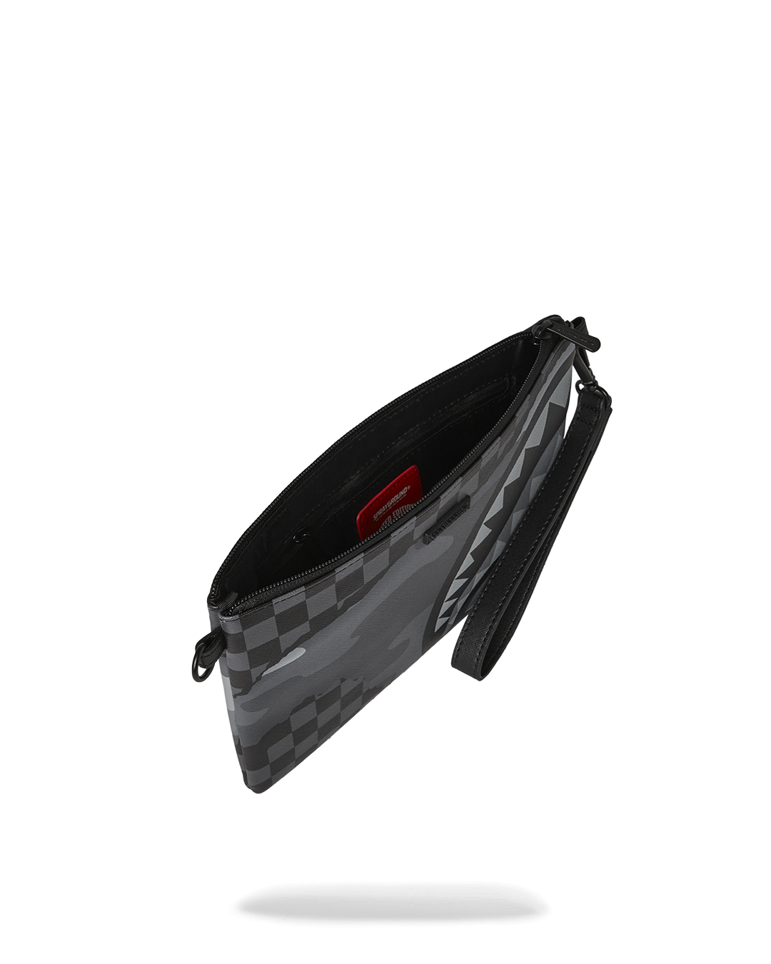 Pouchette-style clutch opened to show interior pocket