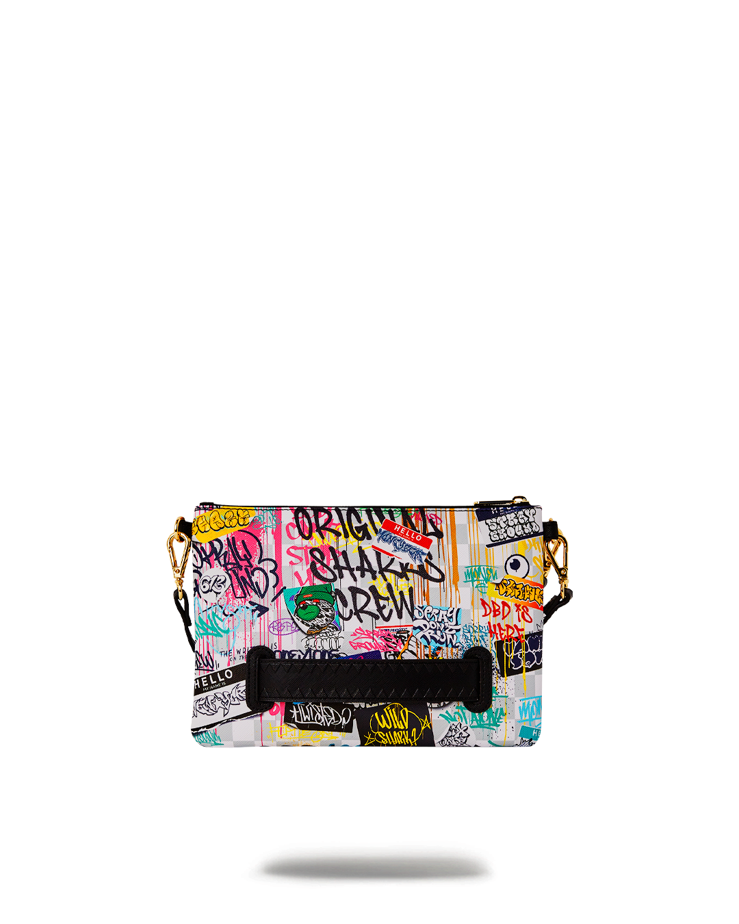 Convertible purse displayed as a clutch with wristlet strap