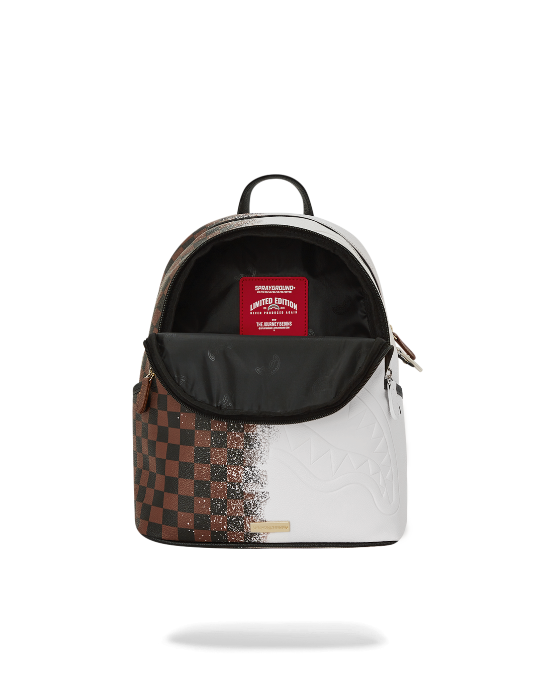 Savage faux leather backpack showing zippered compartments and adjustable straps.
