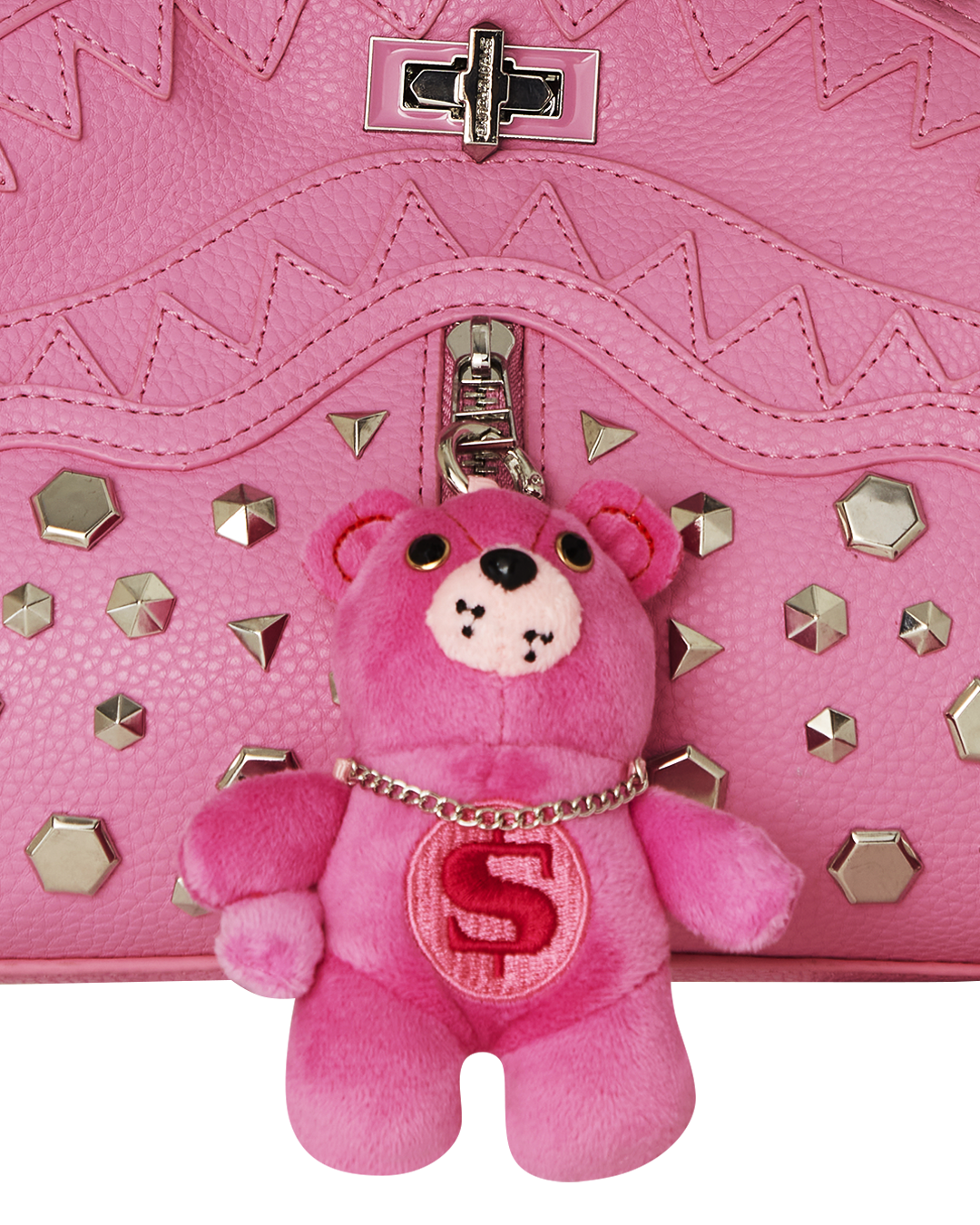 Designer handbag with signature S/G logo details and 100% polyester lining, perfect for formal events.