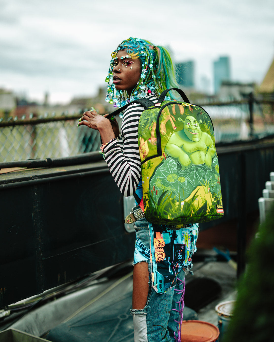 Side view showcasing adjustable straps and ergonomic design.