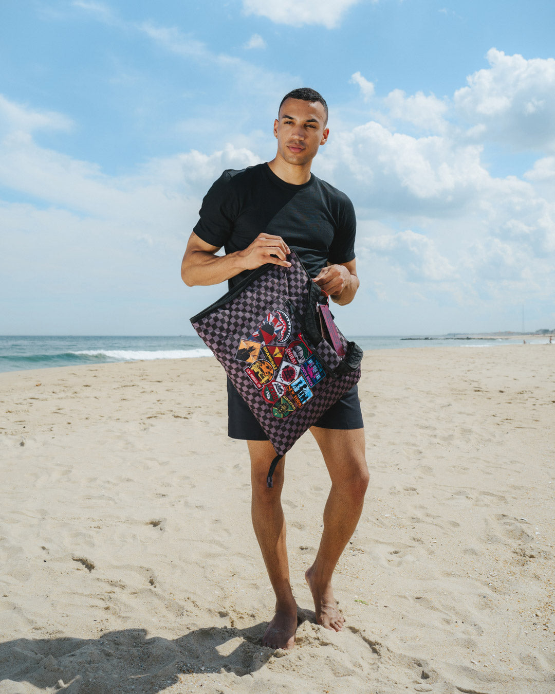 Beach blanket folded into a compact size with water-resistant fabric