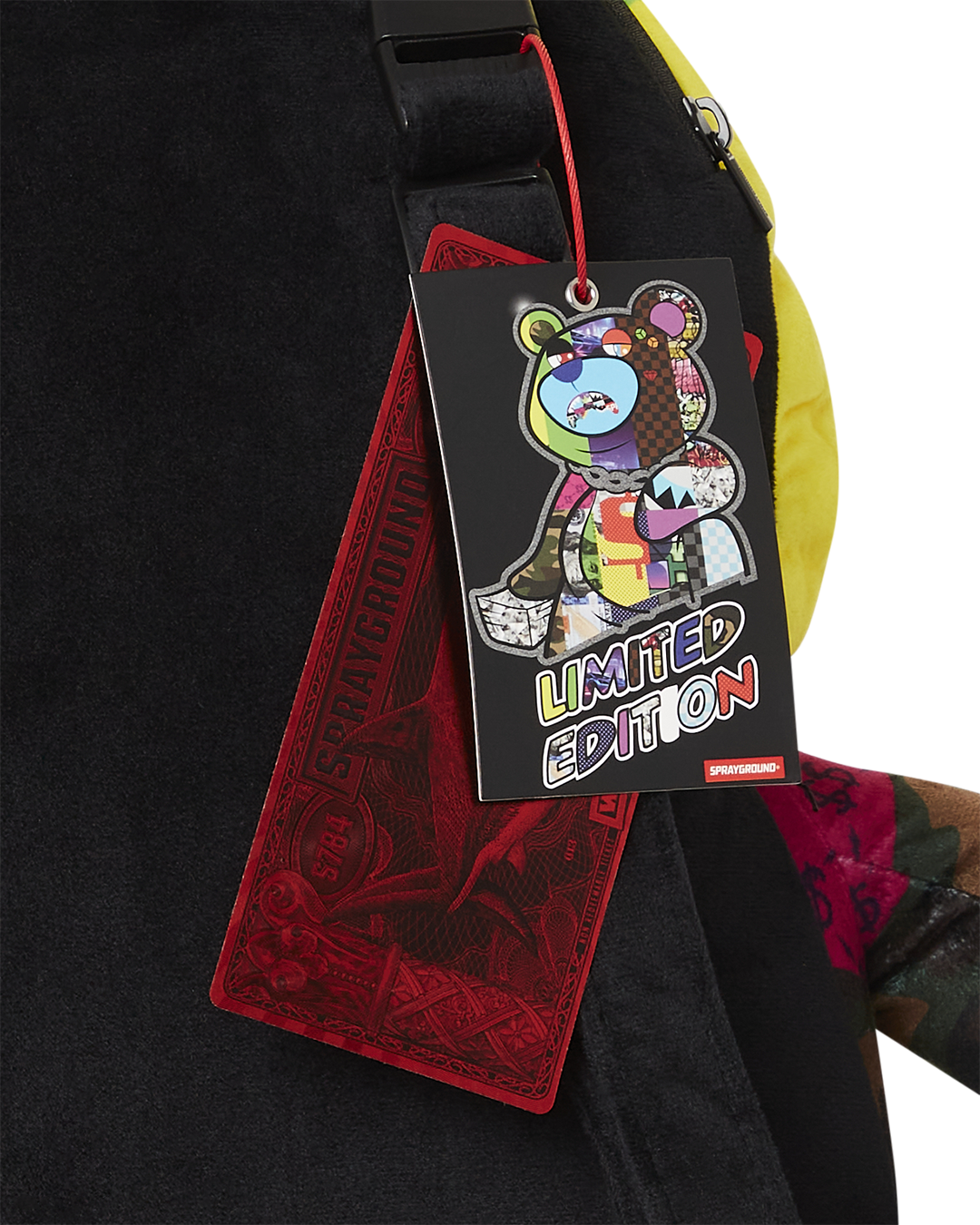Front view of Sprayground teddy bear backpack with detailed pockets.