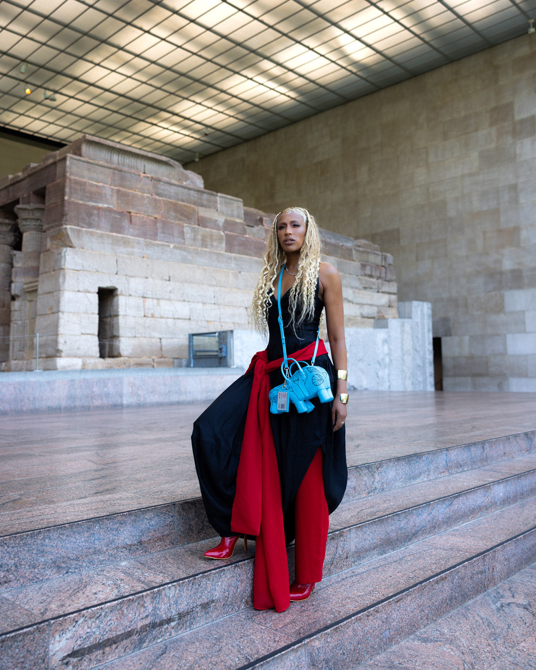 The Met William crossbody handbag with adjustable strap and Egyptian-inspired designs