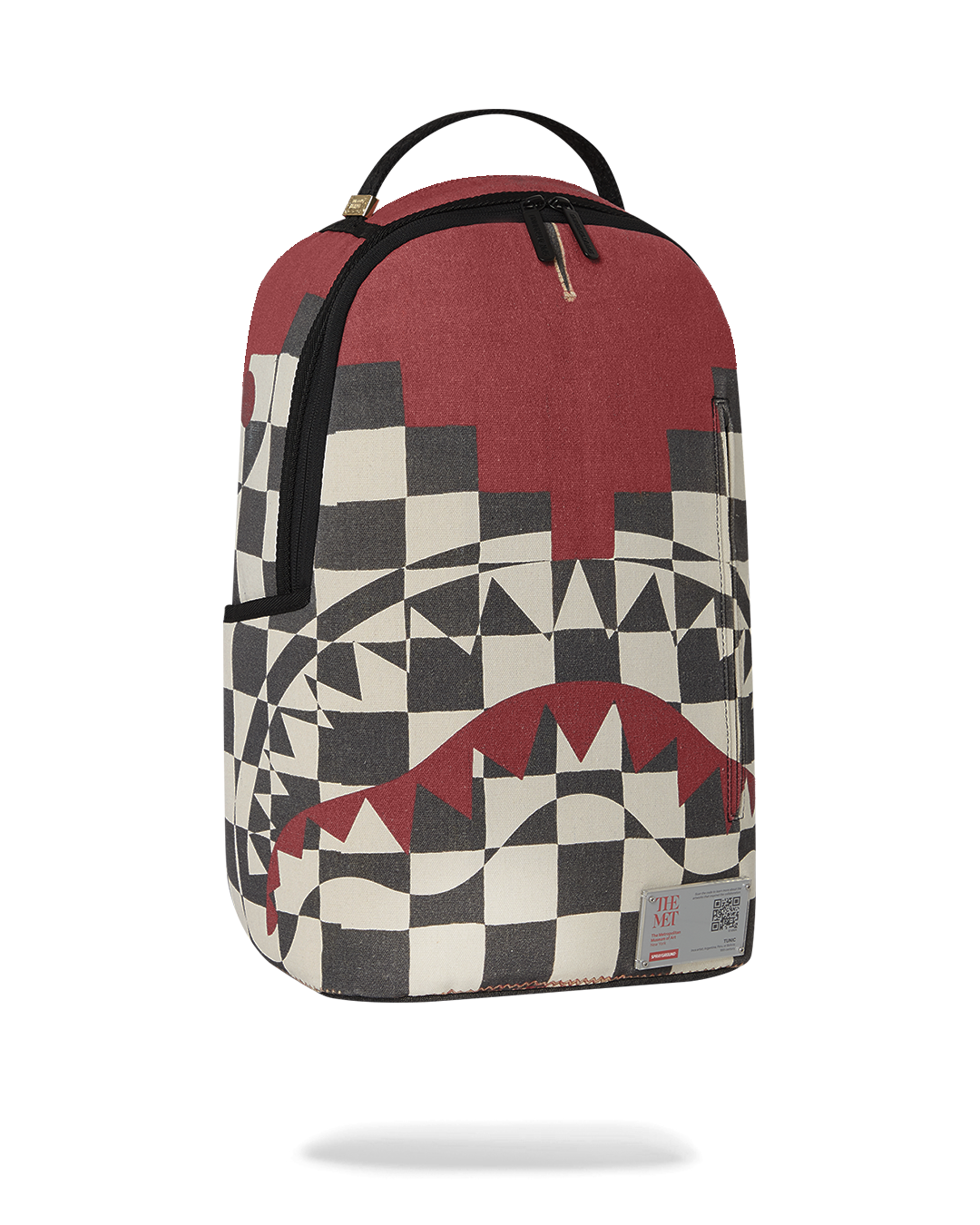 Open backpack displaying the velour laptop compartment and organizer mesh