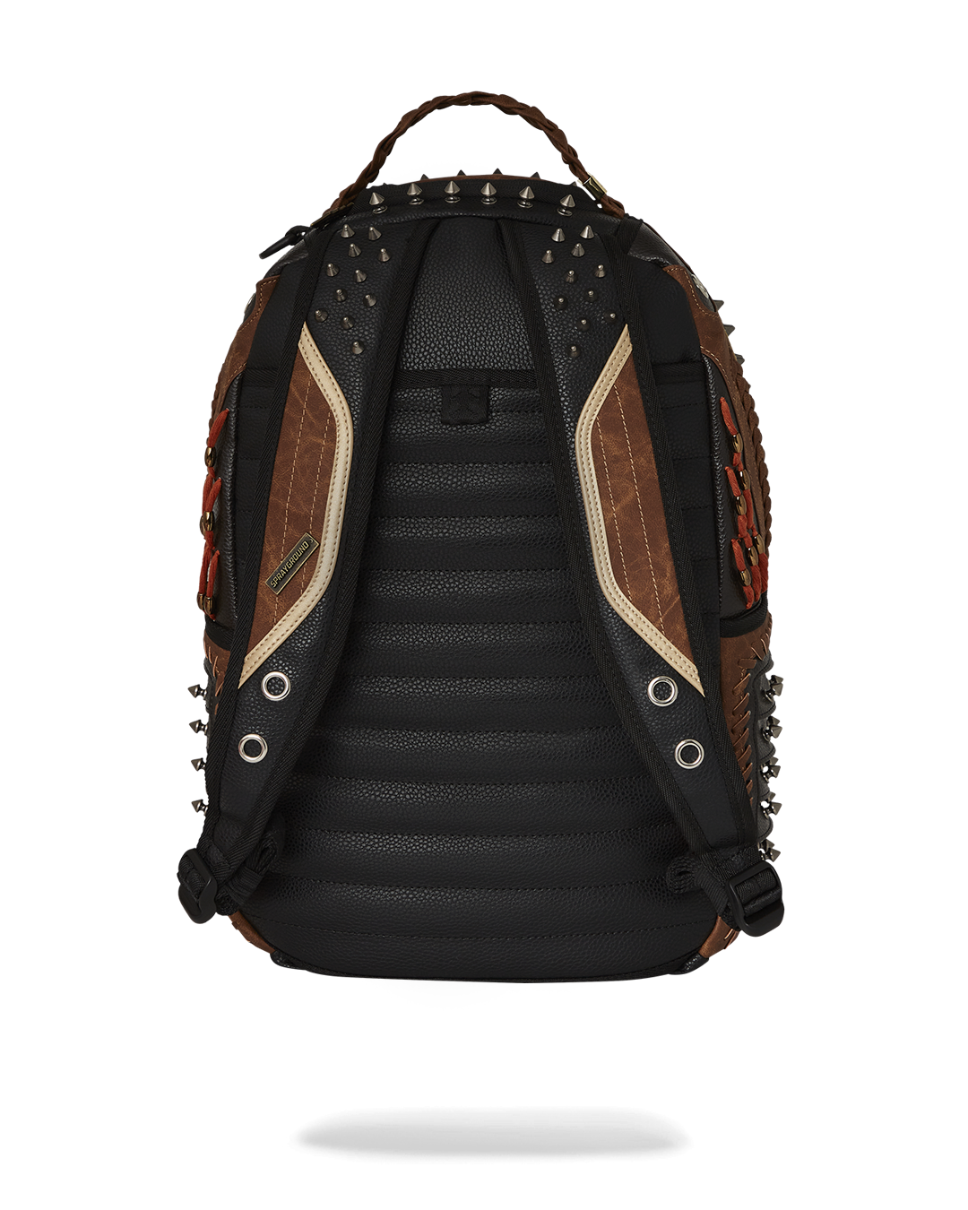 Front view of the faux leather rucksack backpack with gold studs and tassels