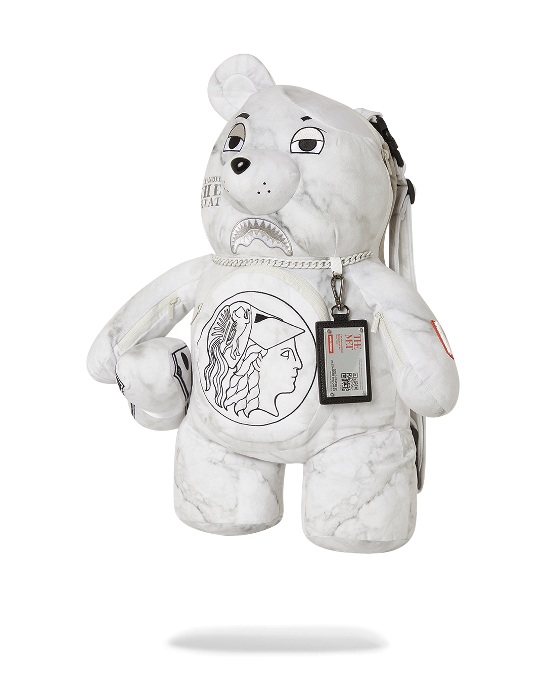 Side view of the Sprayground bear backpack, highlighting its zippered pockets and adjustable straps.