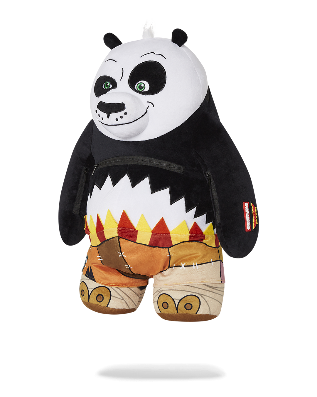 Side angle highlighting the arm compartments of the money bear backpack sitting on brick bench