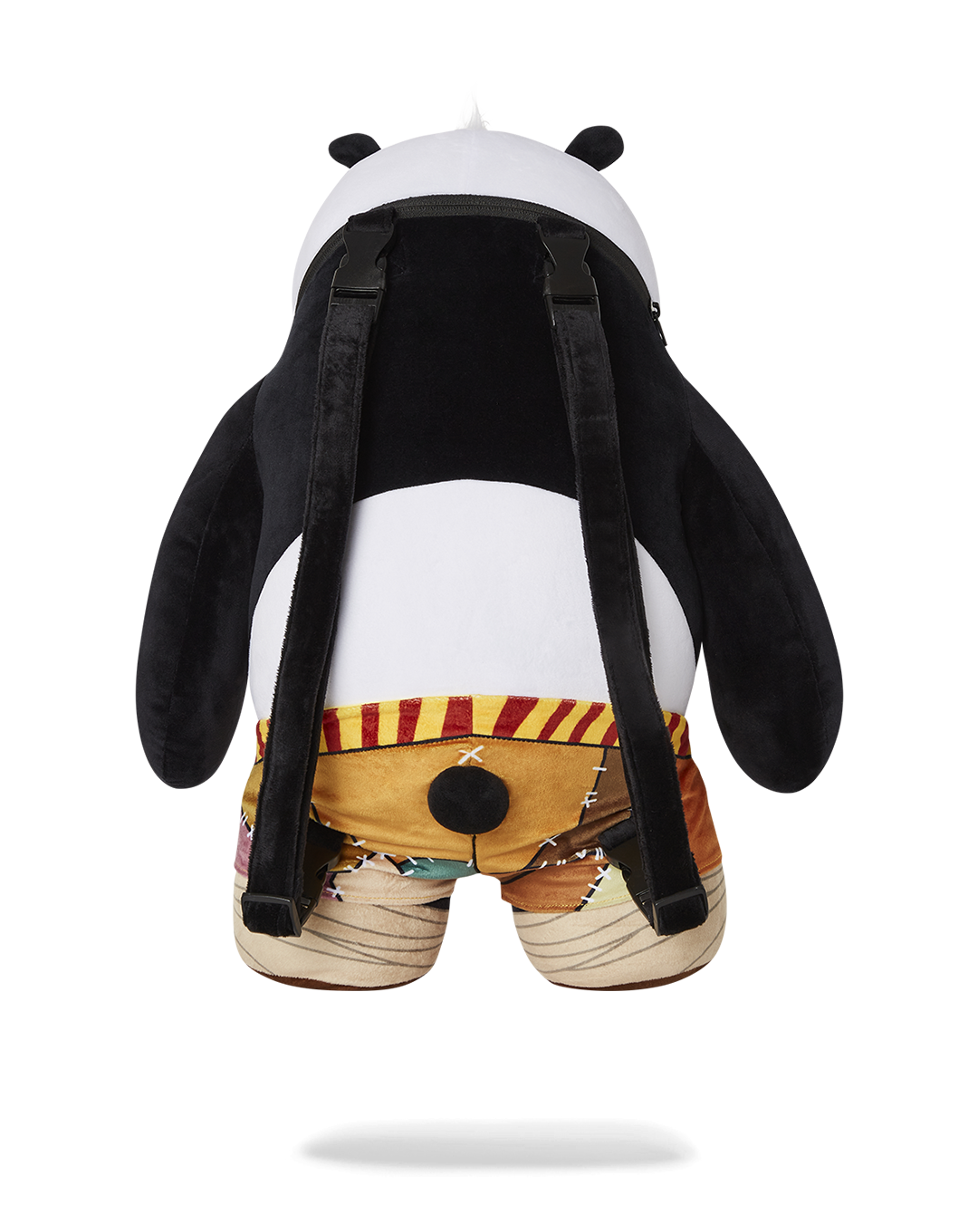 Front view of the teddy bear backpack with zippered belly pocket shown in streetwear setting