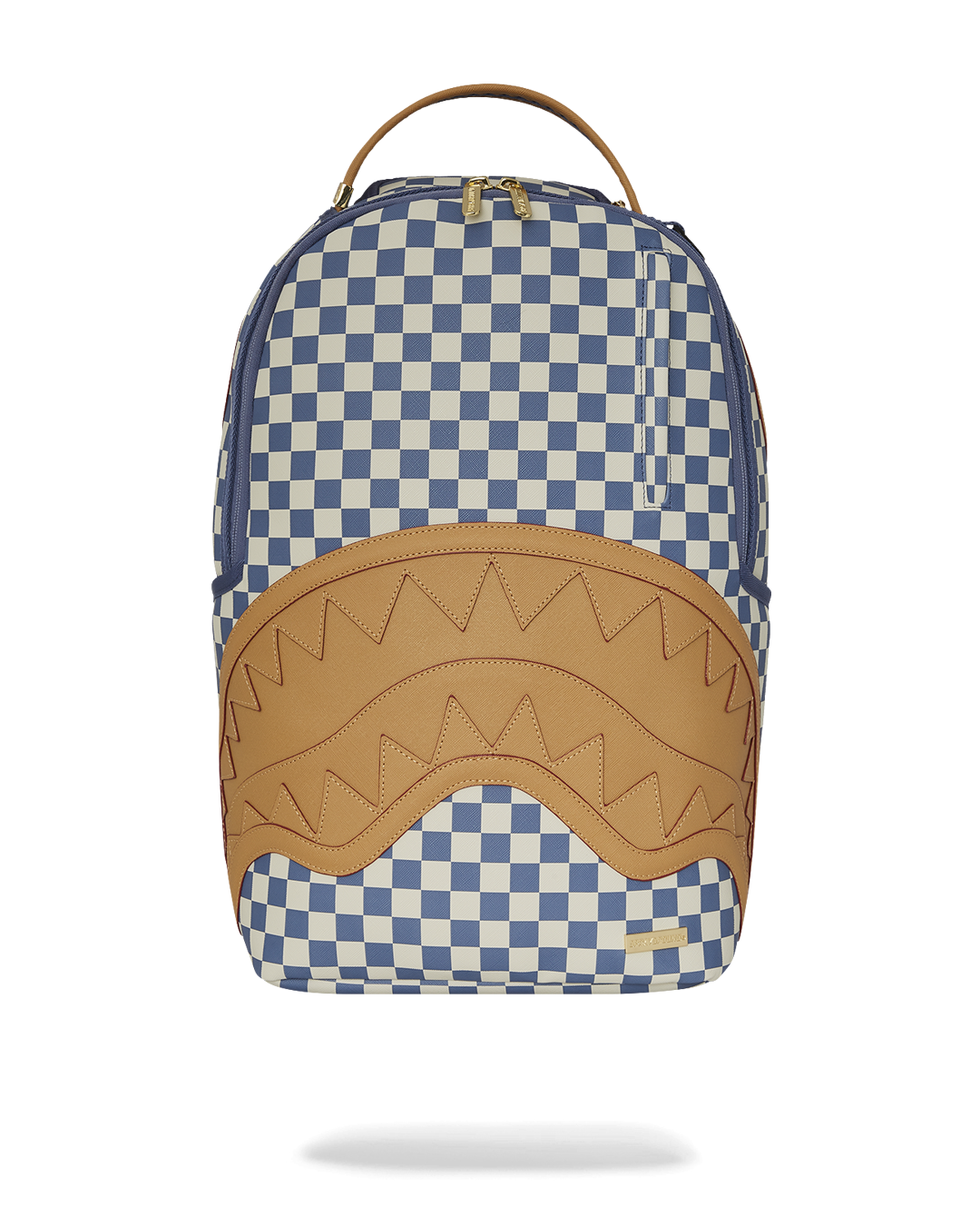 Sprayground shark backpack worn casually with streetwear