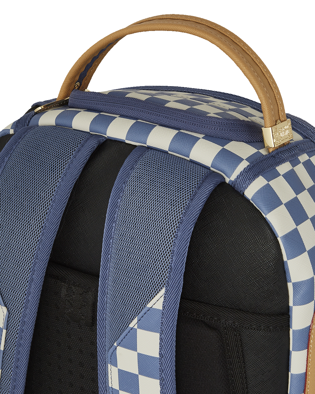 Sprayground shark backpack worn casually with streetwear