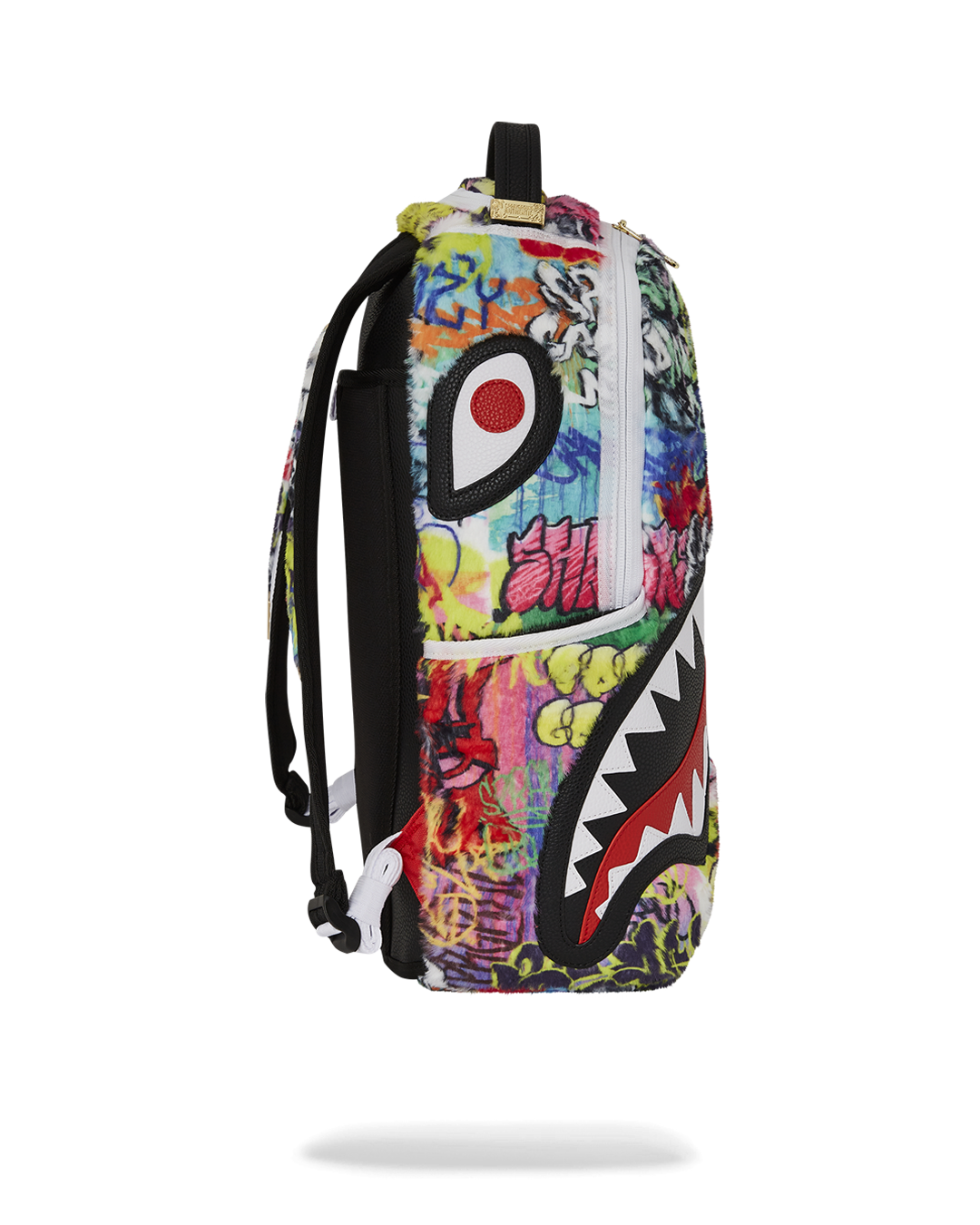 Side pocket of Graffiti Luxe Backpack for quick access to essentials.