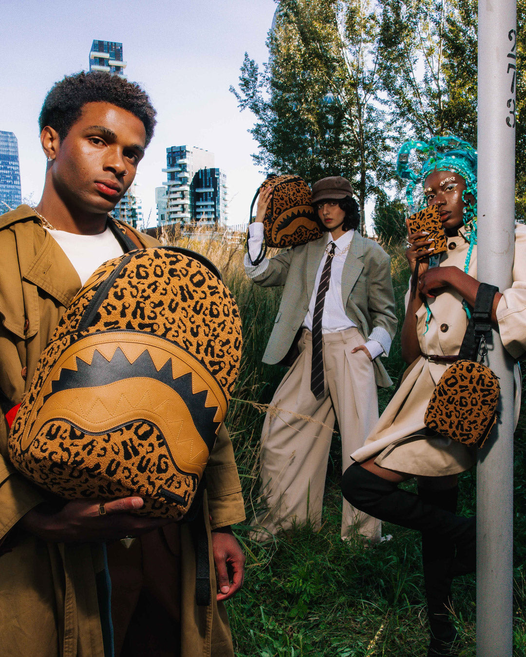 Wild One DLXSF faux leather backpack worn over a shoulder in a city setting