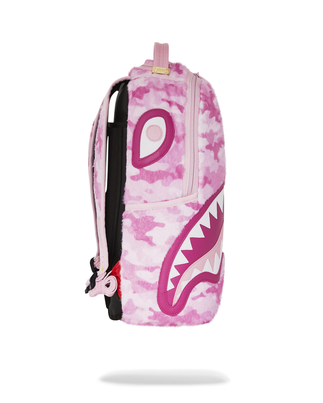 Side angle showcasing backpack compartments and ergonomic padding