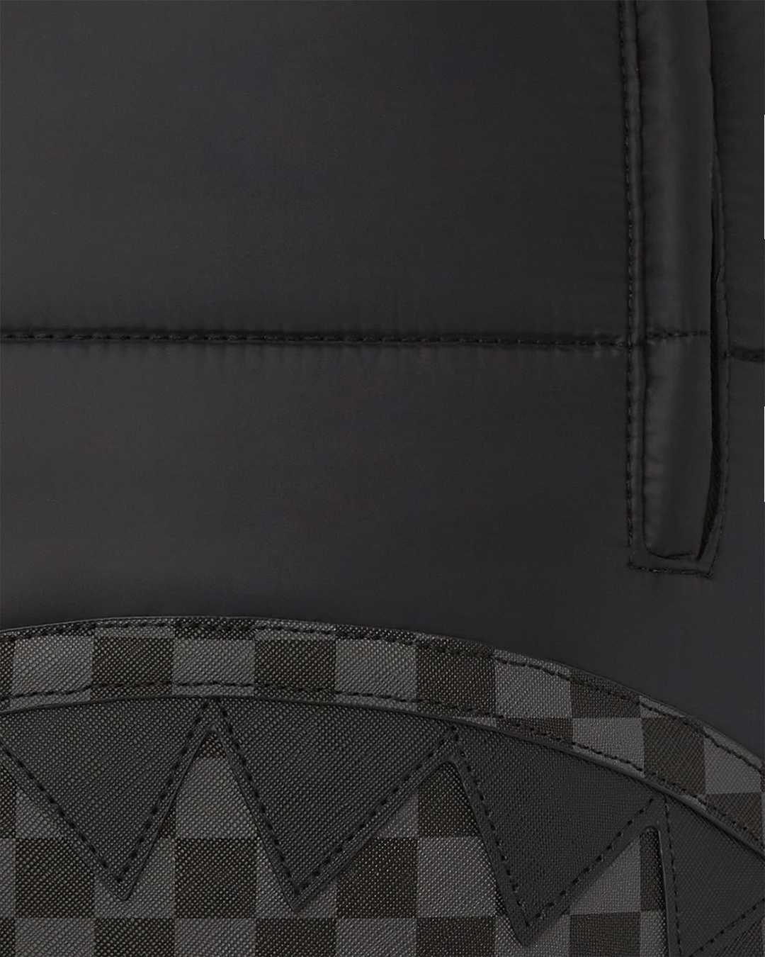Interior view highlighting the separate laptop compartment and organizational pockets.