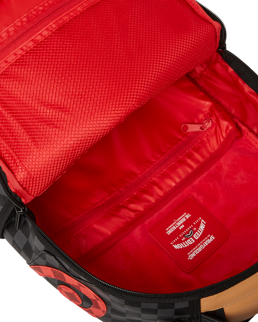 Backpack connected to rolling luggage via slide-through sleeve, ideal for airport travel.