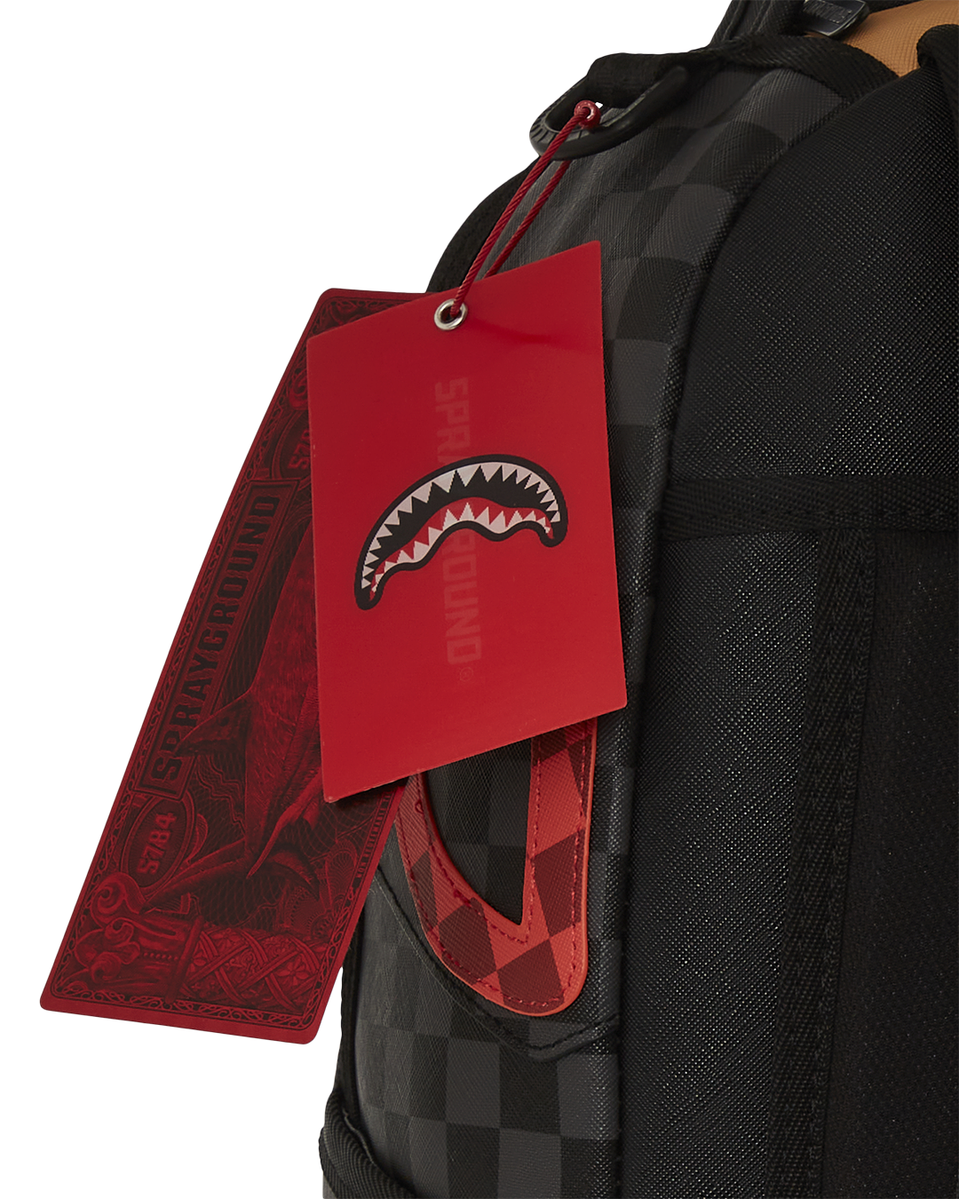 Evil Genius backpack worn crossbody on a city street, showcasing side pockets and adjustable straps.