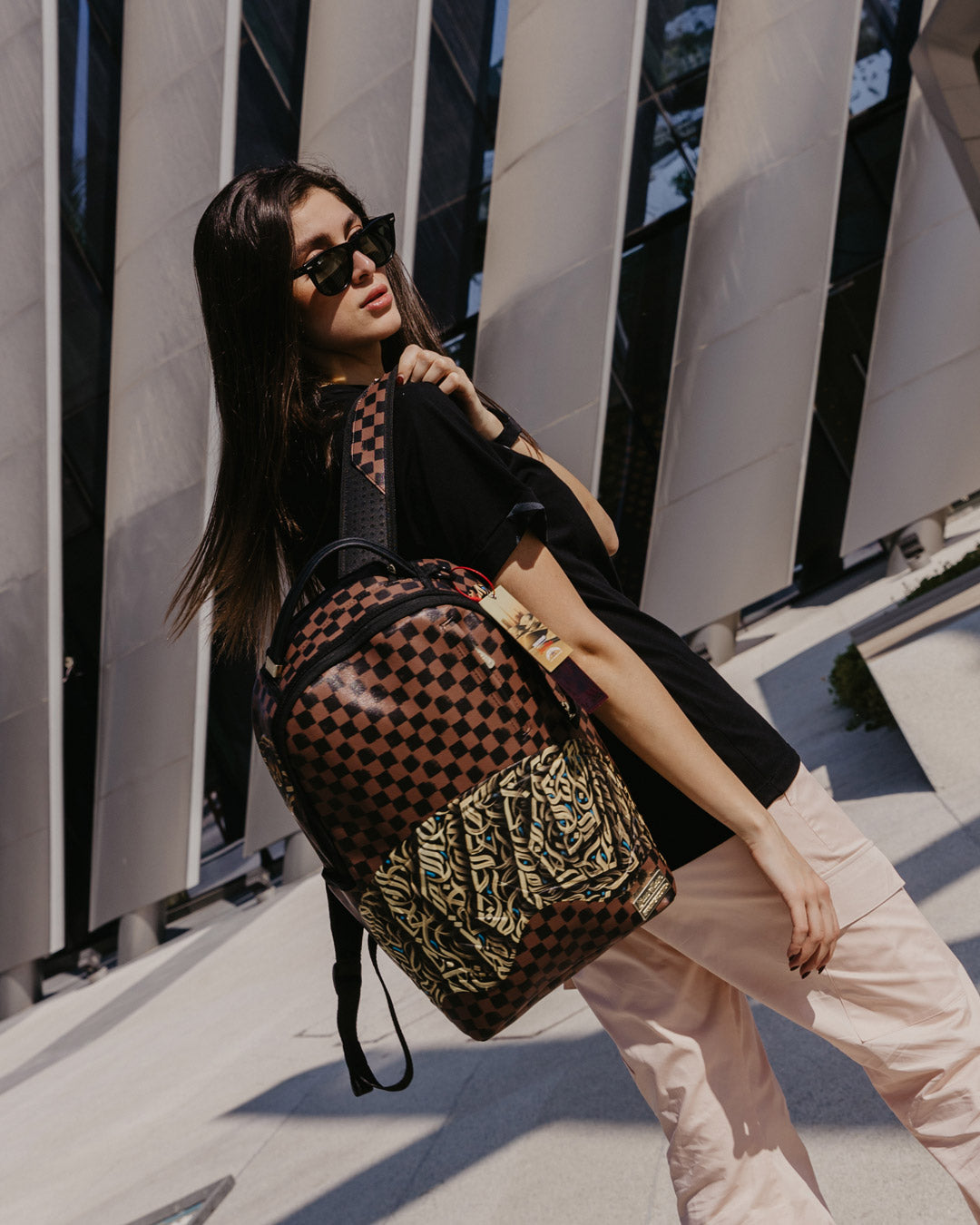 Backpack in use, showing ergonomic mesh back padding and adjustable straps