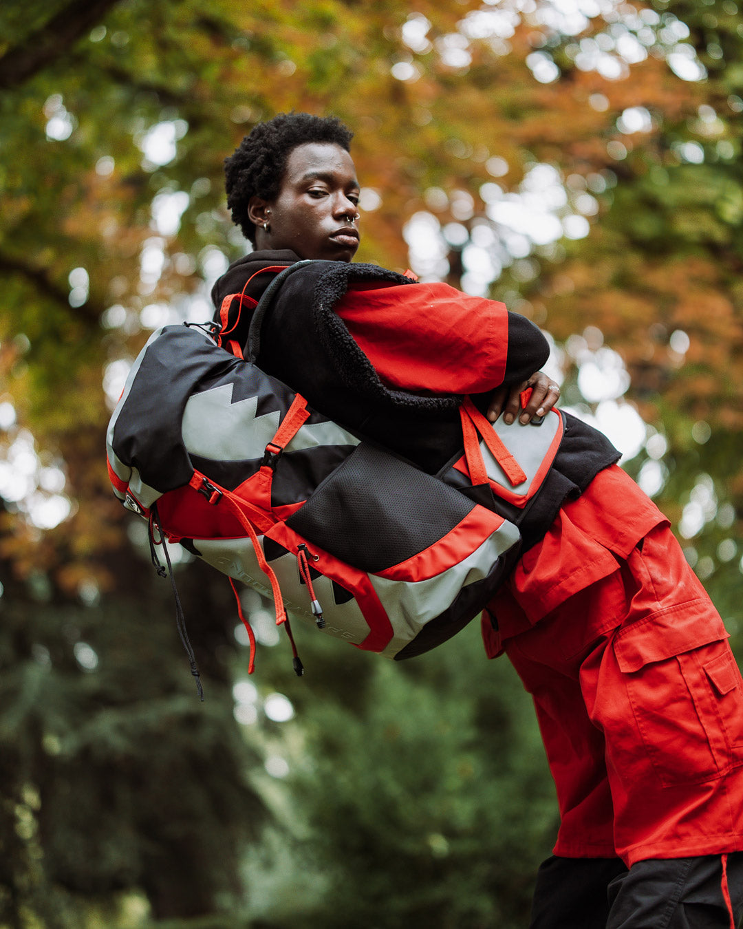Backpack in use during a hiking trip in the Oregon forest, demonstrating comfort and functionality.