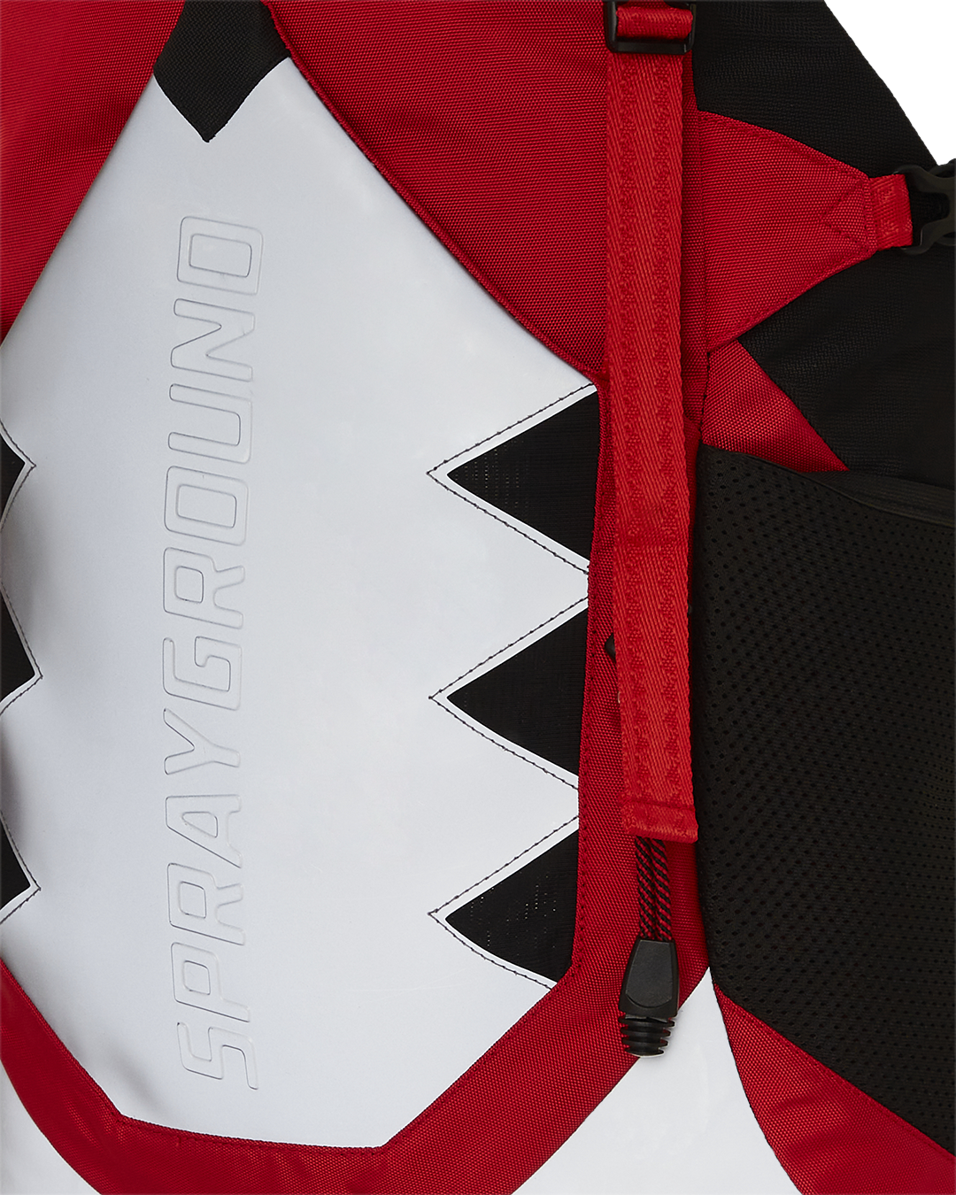 Detail of adjustable straps and emergency waterproof rain cover of the Arctic Trekking Backpack.