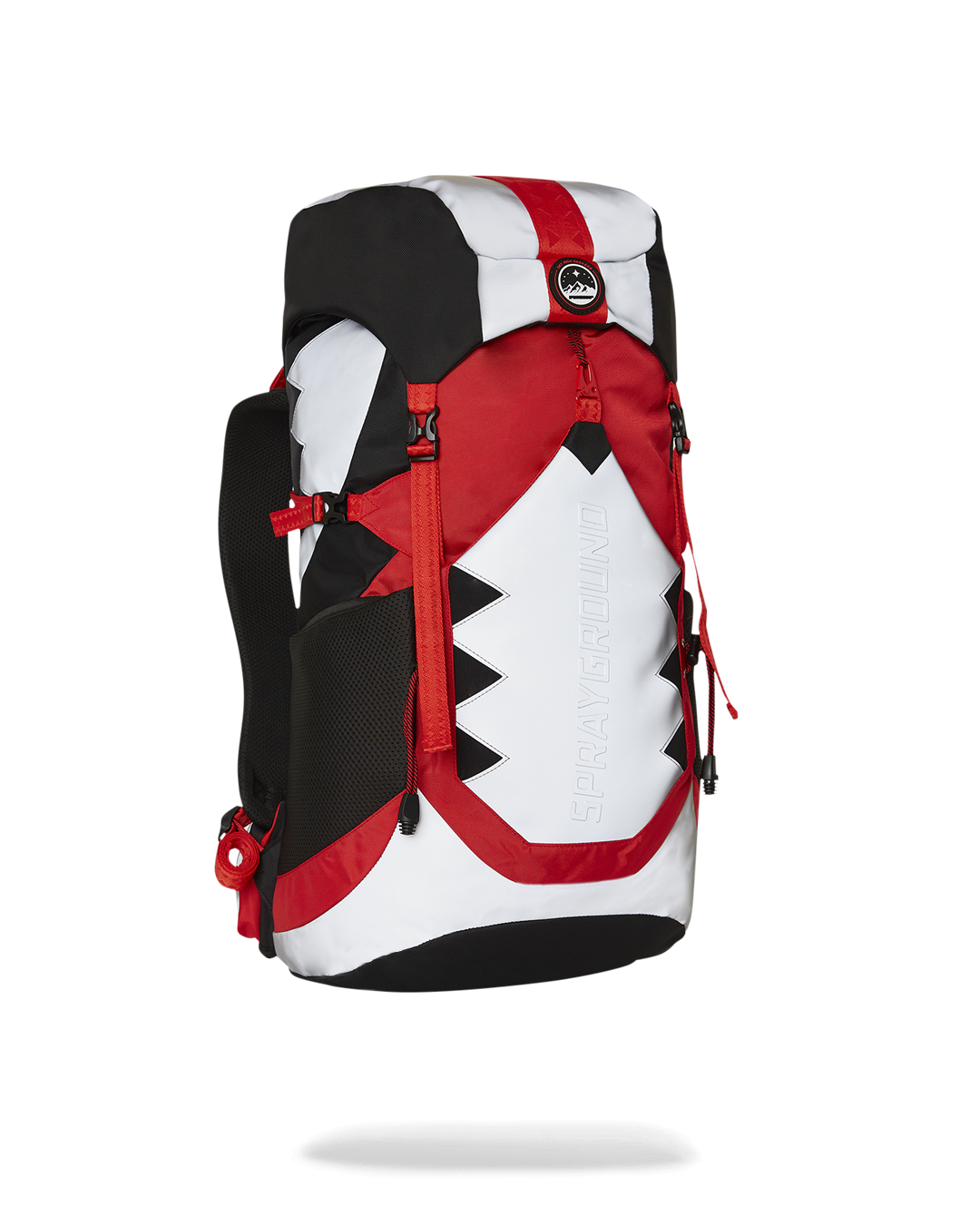 Detail of adjustable straps and emergency waterproof rain cover of the Arctic Trekking Backpack.