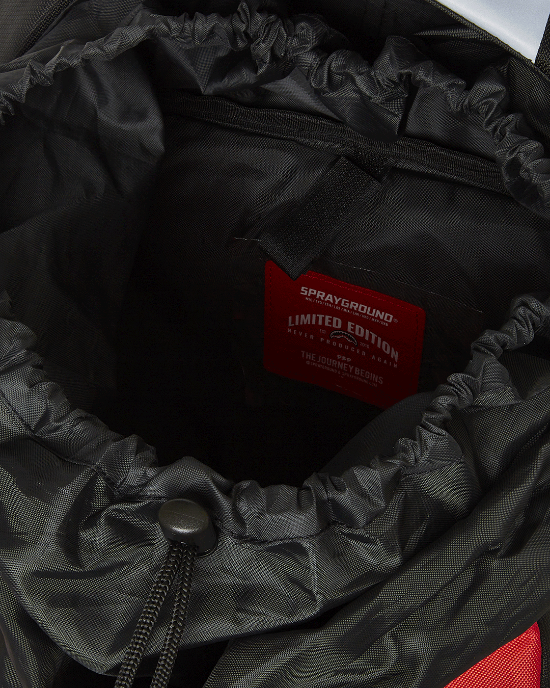 Front view of the Adventure Ready Arctic Trekking Backpack showcasing reflective fabric and pockets.