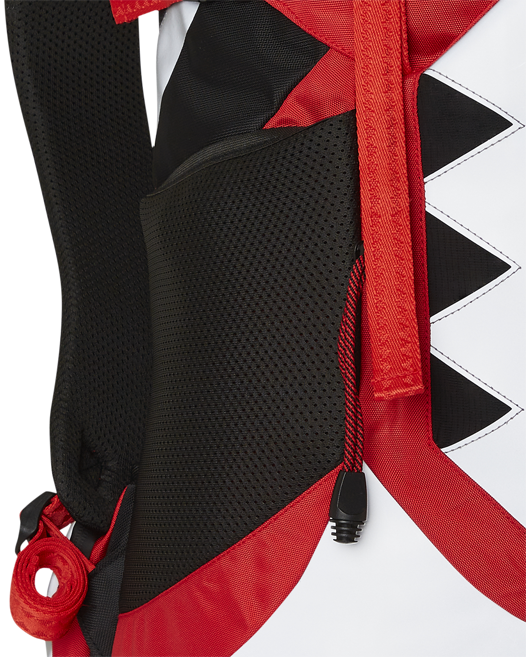 Detail of adjustable straps and emergency waterproof rain cover of the Arctic Trekking Backpack.
