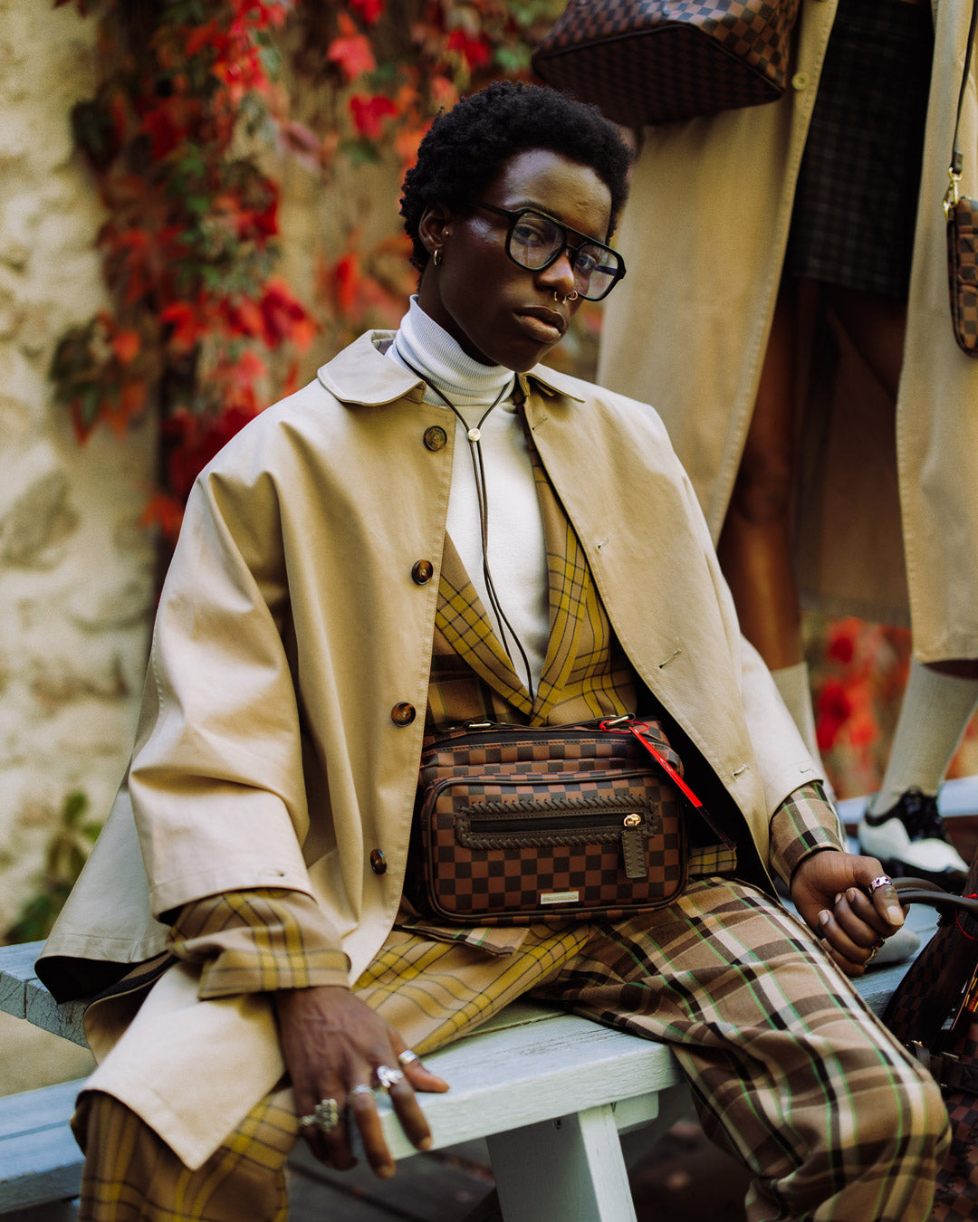 Front view of the Parisian Adventure Leather Crossbody Bag on a city street.
