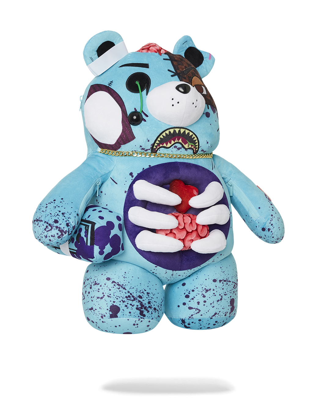 Close-up of Zombie Bear plush backpacks brain unzipping to reveal secret pocket