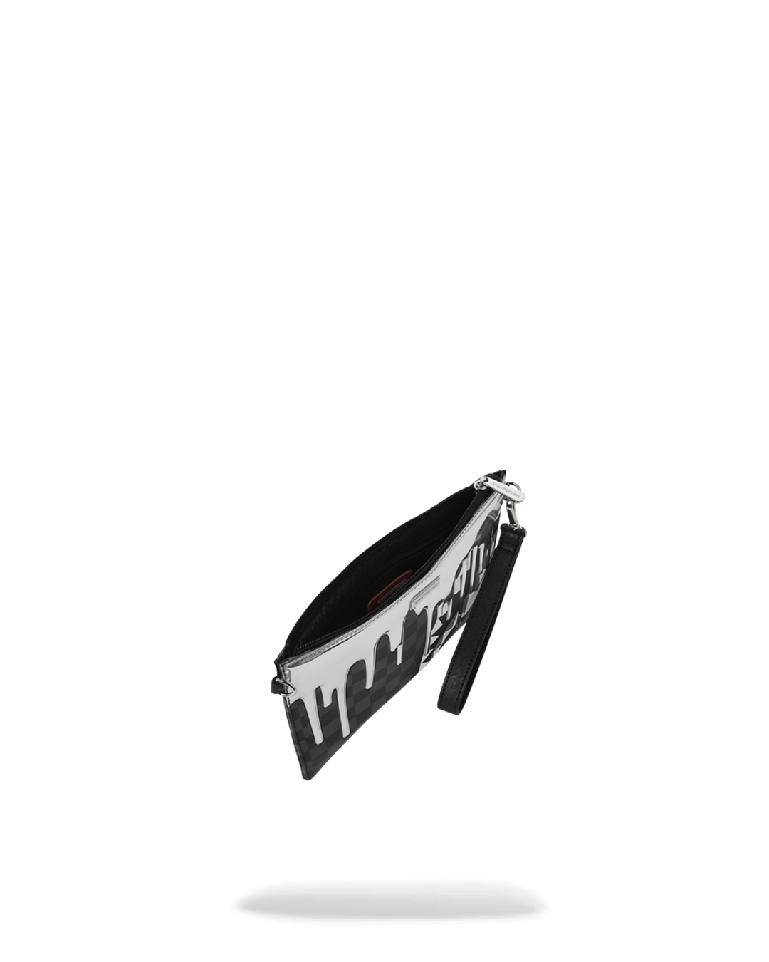 Convertible clutch worn as wristlet with evening outfit