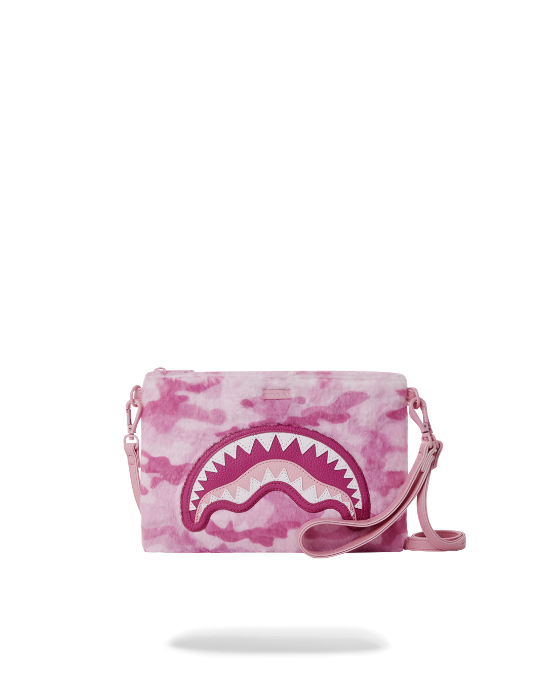 Purrfect Pink Convertible Clutch on a stylish table setting, showing interior design.