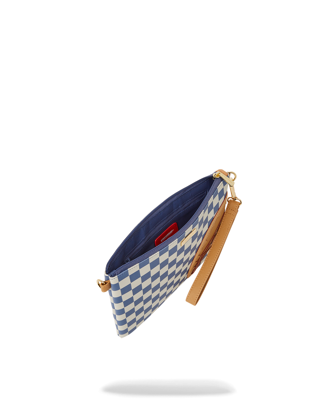 The clutch bag being carried as a crossbody bag, highlighting its adjustable strap