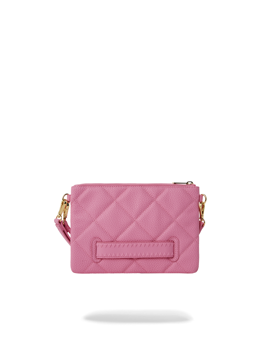 Pink Coach clutch bag held open, showing interior pocket and wristlet strap.