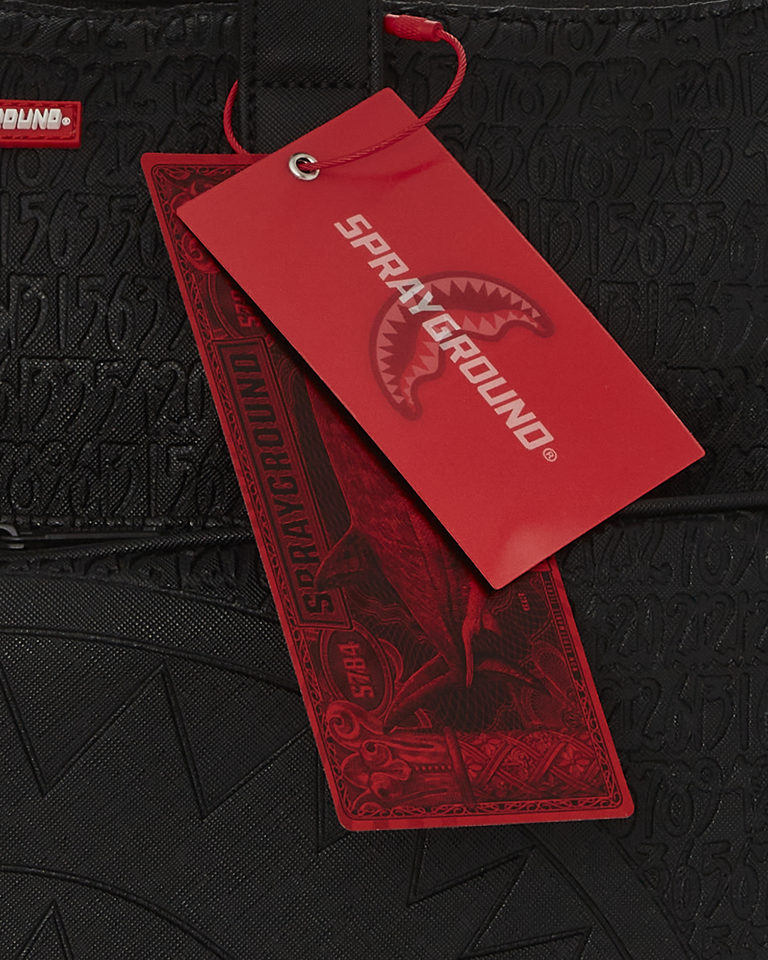 Close-up of water-resistant fabric and metal zipper details