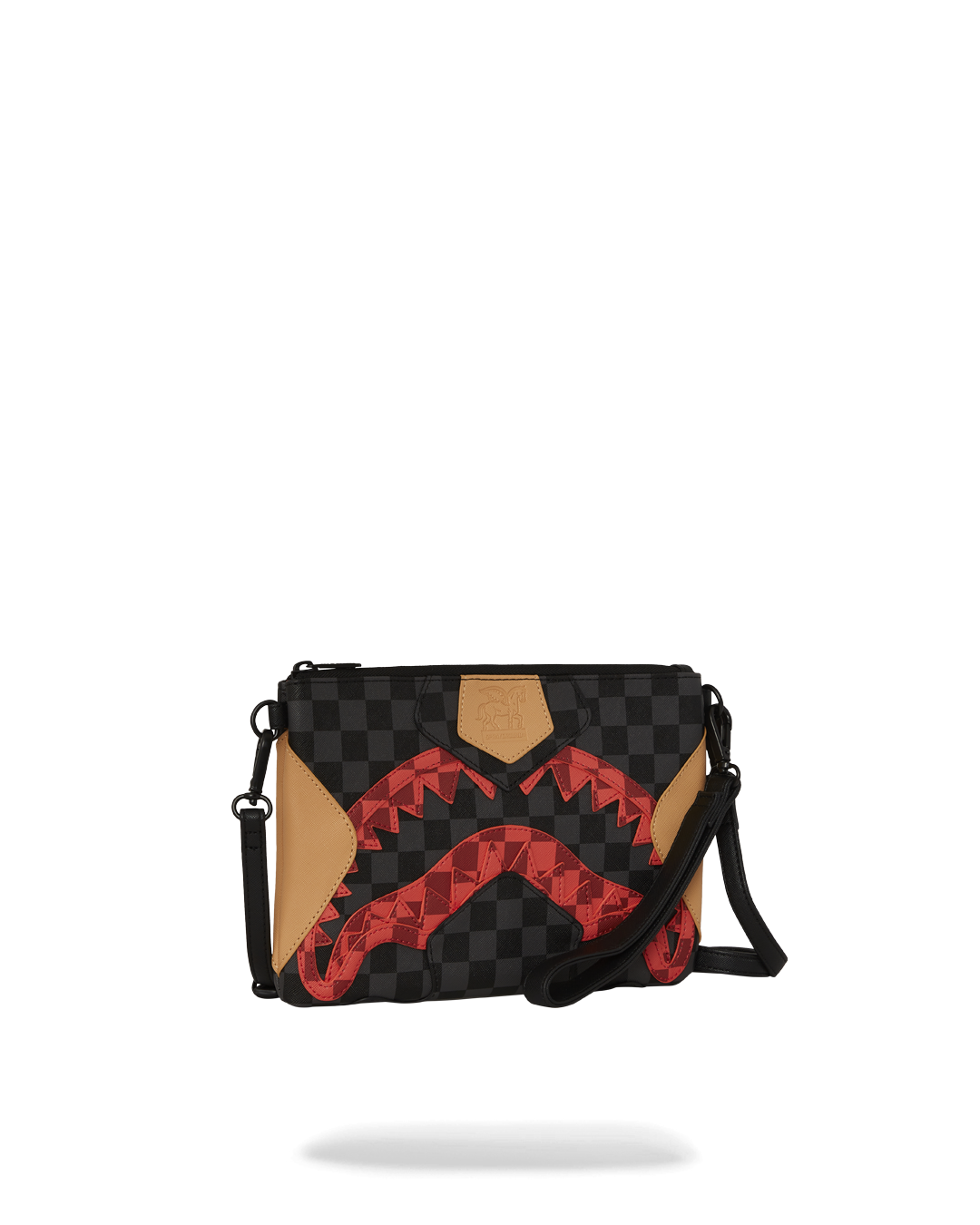 Model carrying the crossover purse as a wristlet during a night out